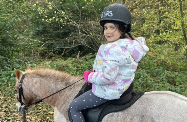 young girl on horse